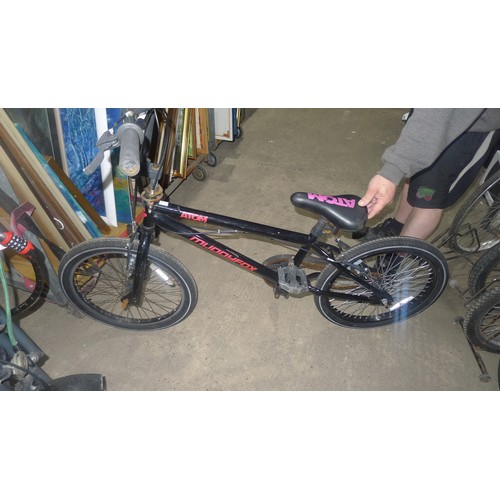 2084 - A black BMX bike by muddyfox type atom