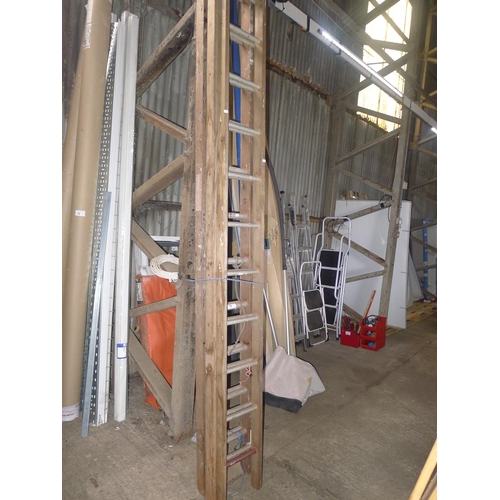 79 - 2 wooden double extending ladders with aluminium rungs (1 x 18 tread and 1 x 16 tread)