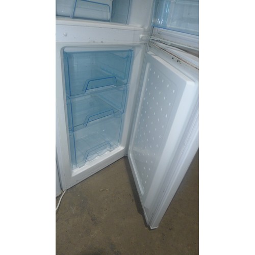 3091 - A fridge freezer by Ice King - requires attention - trade