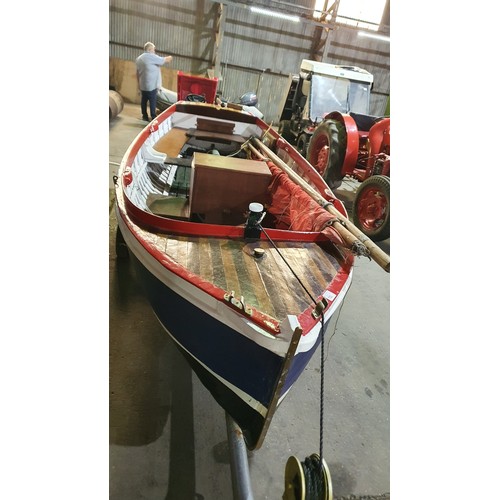 752 - Clinker built wooden sailing boat circa 1935, with gaff rig, approx 15ft, on road trailer. fitted wi... 