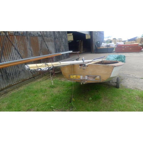 751 - Enterprise sailing Dinghy on launching trolley, Ply built, buoyancy bags, mast, rudder centre board ... 