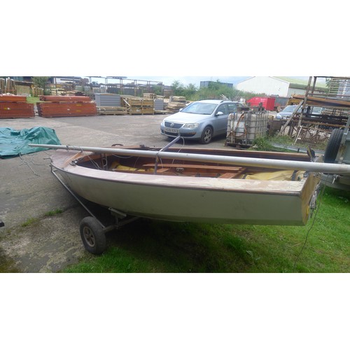 751 - Enterprise sailing Dinghy on launching trolley, Ply built, buoyancy bags, mast, rudder centre board ... 