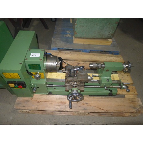 355 - 1 bench top metal turning lathe by Warco, no model visible, bed length approx 67cm, supplied with a ... 