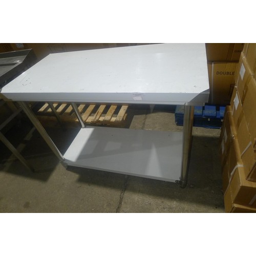 3111 - A commercial stainless steel catering type table with shelf beneath by Diaminox approx 1200x600x900m... 