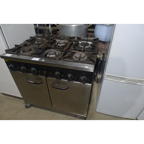 3100 - A gas fired 6 burner range with 2 door oven beneath by Buffalo - trade