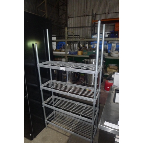 3104 - A bay of catering type racking with 4 shelves