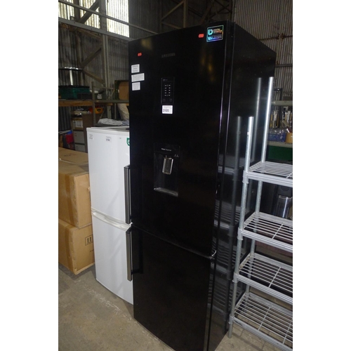 3105 - A black fridge freezer by Samsung Type RB31FDJNDBC with water dispenser - 240v trade