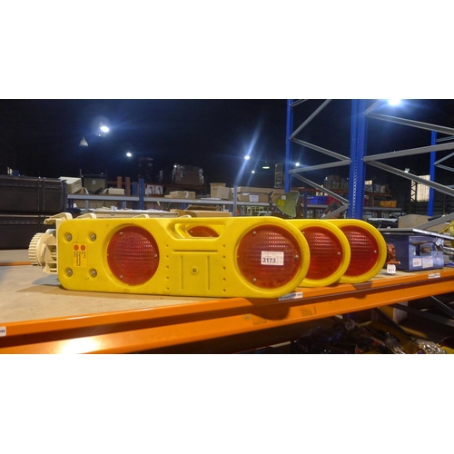 3173 - 4 yellow plastic bollard type assemblies each with two red and amber lights fitted