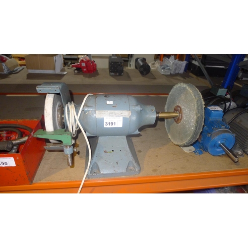 3191 - A double ended bench grinder fitted with an 8 inch grinding wheel on one end and a 10 inch polishing... 