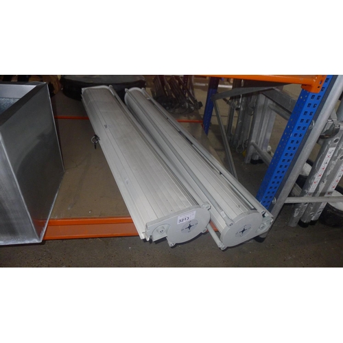 3213 - 2 pull down plastic roller shutter screens by Wavis each approx 133cm wide