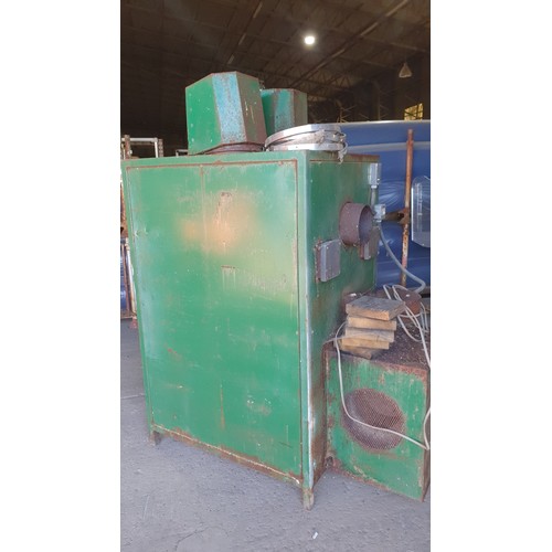 3420 - 1 used woodburning waste burner,  Talbott 150, 50Kw for workshop heating, with a qty of flue.