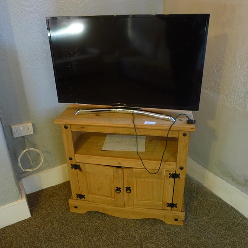 57 - The contents of the cottage living room comprising a JVC 40 inch LED Smart TV,  a pine TV cabinet an... 