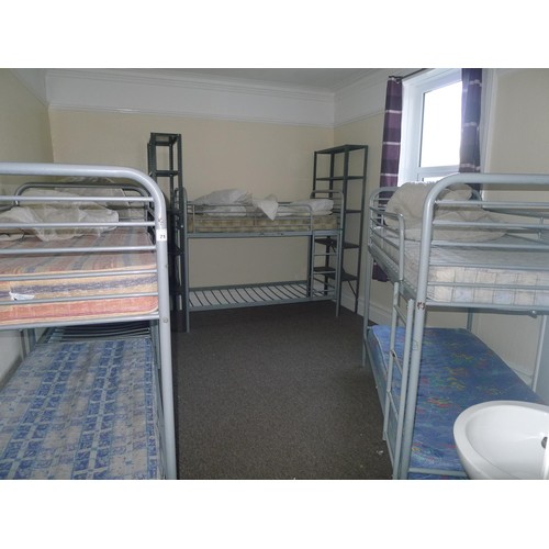 71 - The contents of a student dormitory Room 6 comprising of 8 bunk beds and 3 bays of Dexion type racki... 