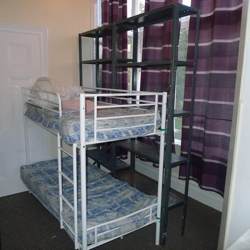 73 - The contents of a student dormitory Room 4 comprising of 8 bunk beds and 5 bays of Dexion type racki... 