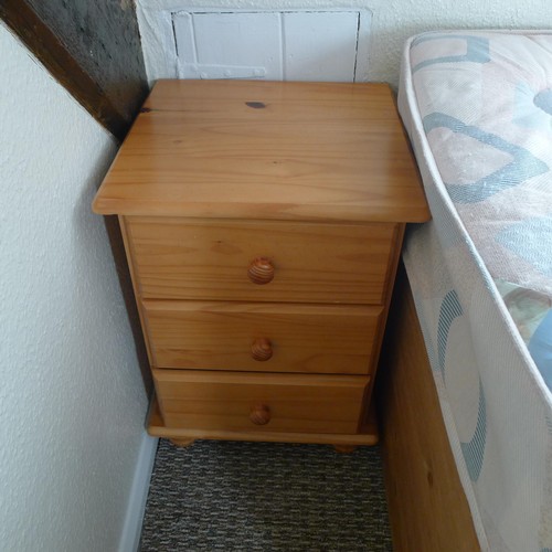 79 - A pine single bed with storage under, a pine bedside cabinet, a chair and a mirror - Situated in tea... 