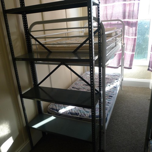 82 - The contents of a student dormitory Room 2 comprising of 6 bunk beds and 5 bays of Dexion type racki... 