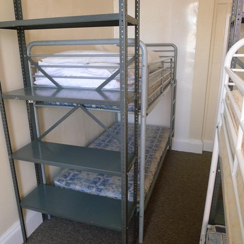 82 - The contents of a student dormitory Room 2 comprising of 6 bunk beds and 5 bays of Dexion type racki... 