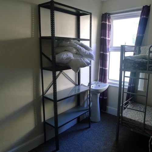 84 - The contents of a student dormitory Room 3A comprising of 2 bunk beds and 2 bays of Dexion type rack... 