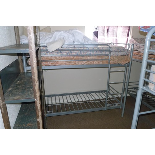 86 - The contents of student dormitory comprising of 9 bunk beds and 5 bays of Dexion type racking - Situ... 