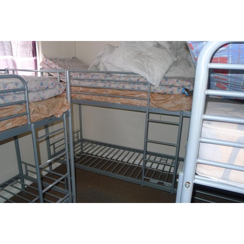 86 - The contents of student dormitory comprising of 9 bunk beds and 5 bays of Dexion type racking - Situ... 