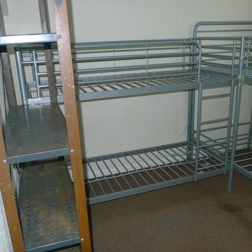 86 - The contents of student dormitory comprising of 9 bunk beds and 5 bays of Dexion type racking - Situ... 