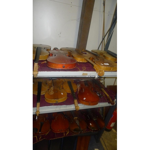 3001 - 14 miscellaneous violins and 2 bows in various states of repair and condition (3 shelves)