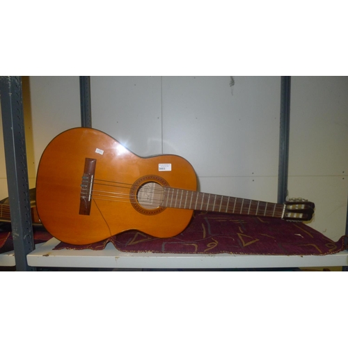 3003 - A 6 string acoustic guitar, label inside 