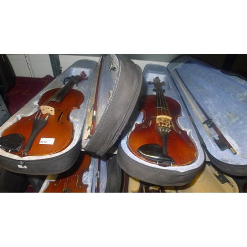 3010 - Two violins with bows and carry cases