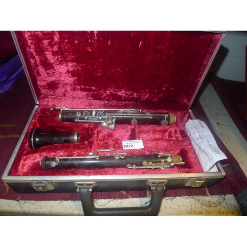 3022 - An oboe in carry case by Excelsior Hawkes