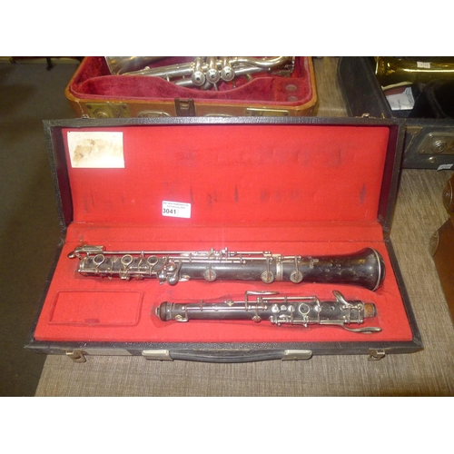 3041 - An oboe with carry case by Stirling, number 9298