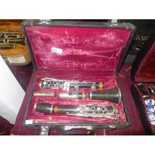 3058 - A Chinese clarinet number M4001, with carry case