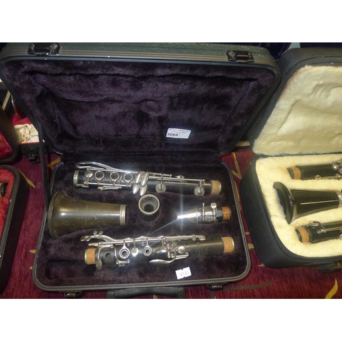 3069 - A Boosey and Hawkes number 77 clarinet with carry case