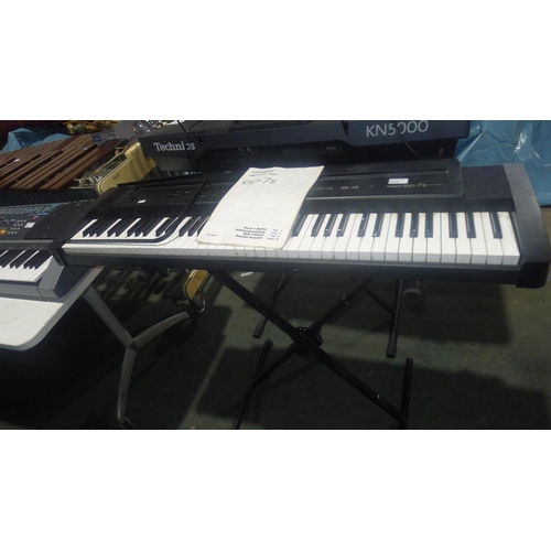 3094 - A Roland ep.7ii digital piano with stand