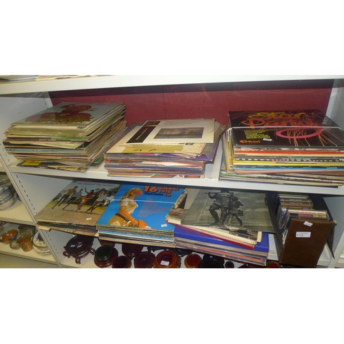 3112 - A quantity of a vintage vinyl LP records and cassettes (2 shelves)