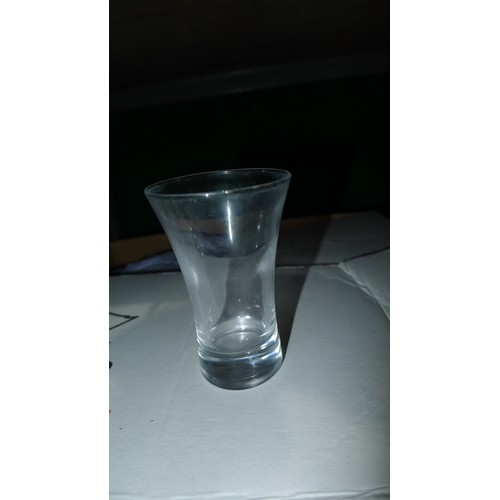 1043 - A box containing a quantity of various shot glasses