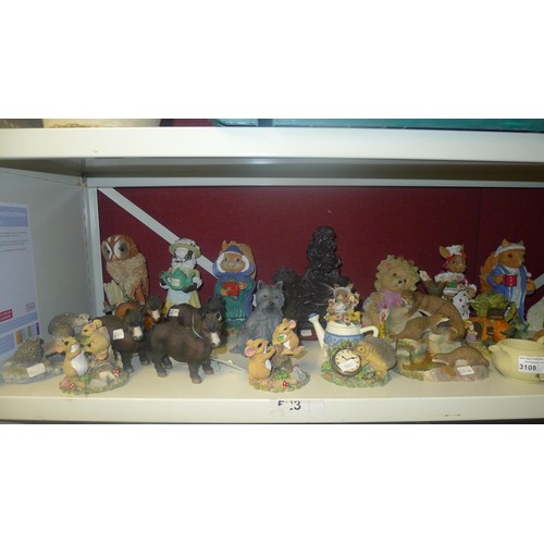 3108 - A large quantity of decorative resin animals and ornaments etc. A quantity of fridge magnets, variou... 