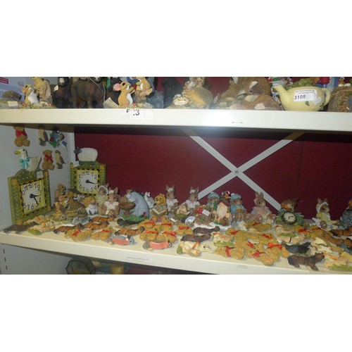 3108 - A large quantity of decorative resin animals and ornaments etc. A quantity of fridge magnets, variou... 