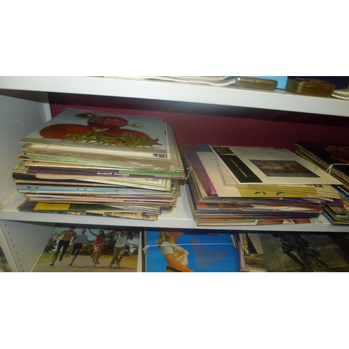 3112 - A quantity of a vintage vinyl LP records and cassettes (2 shelves)