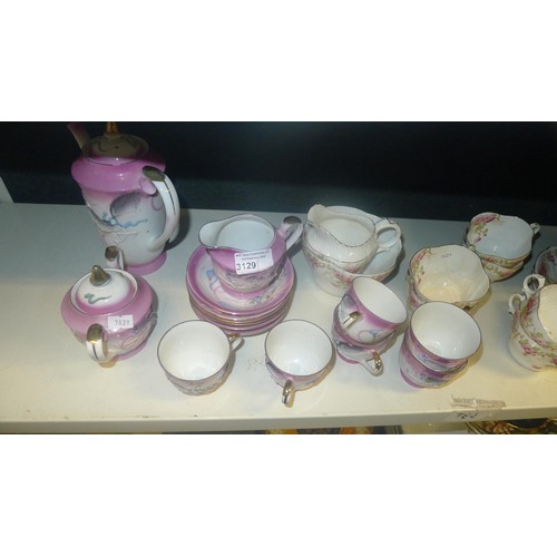 3129 - A part floral patterned tea set and a part Japanese coffee set (one shelf)