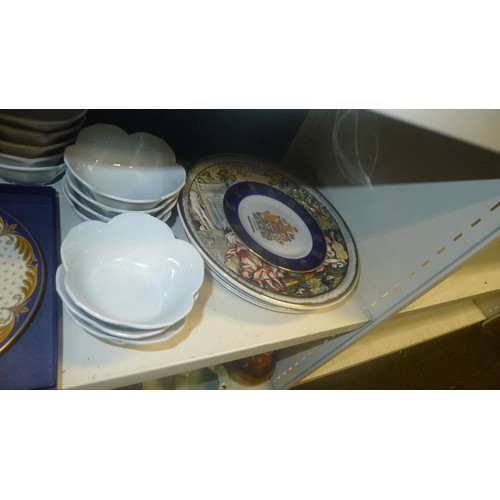 3130 - A quantity of miscellaneous decorative wall plates small vases and other ornaments etc (two shelves)