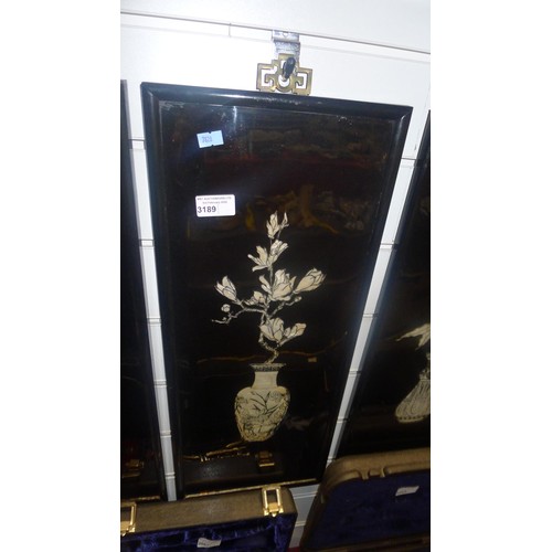 3189 - A set of four Japanese black framed mother of pearl pictures of vases