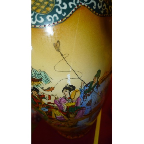 3239 - A tall multi-coloured figure decorated Chinese vase approximately 61 cm tall