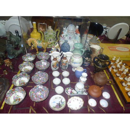 3314 - A Chinese Buddha, two Chinese teapots and a quantity of miscellaneous decorative Chinese and other c... 