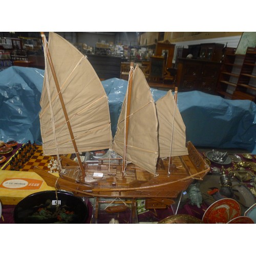 3326 - A wooden model of a 3 mastered Chinese junk