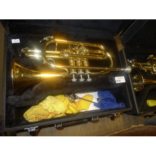 3029 - A brass cornet with carry case by Elkhart