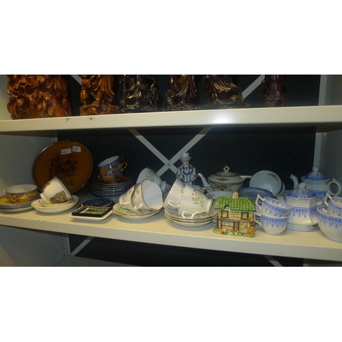 3139 - A floral patterned tea set, an oriental decorated tea set, a blue and white decorative tea set, a No... 