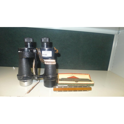 3145 - Two vintage harmonicas and a pair of vintage binoculars by Nottingham Instruments 1941