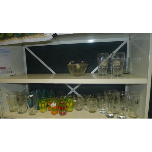 3163 - A quantity of misc decorative drinking glasses (2 shelves)