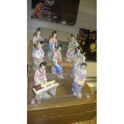 3181 - A boxed set of 8 Chinese musician figures