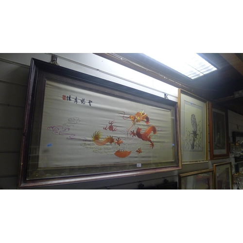 3188 - A large framed Japanese silk embroidery of a dragon